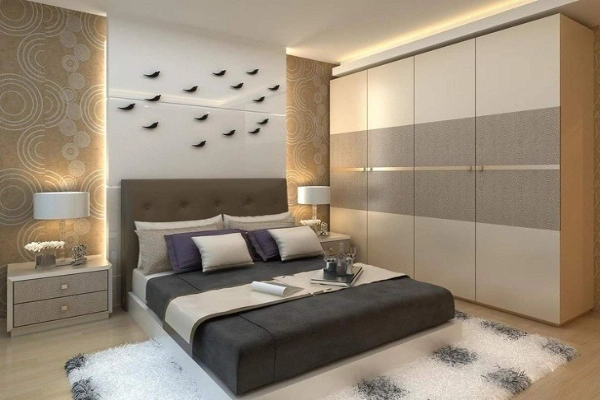 a bedroom with accent wall and floor to ceiling wardrobe2
